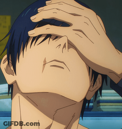 A Close Up Of A Person Covering Their Face With Their Hands GIF