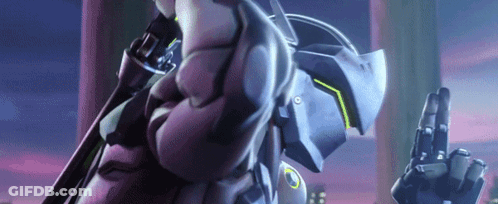 A Close Up Of A Person Holding A Gun In Their Hand And Giving A Peace Sign . GIF