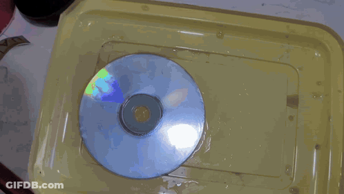 A Close Up Of A Person Holding A Piece Of Paper That Says ' 3M ' On It GIF