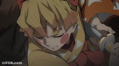A Close Up Of A Person Holding A Sword In Their Hand GIF