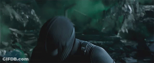 A Close Up Of A Person In A Black Mask GIF