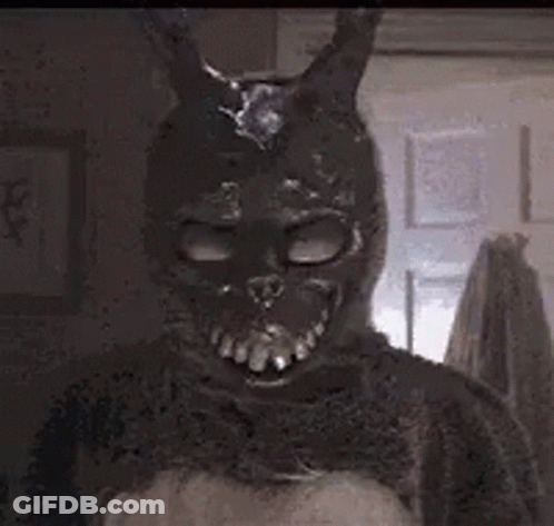 A Close Up Of A Person In A Bunny Costume With A Light Coming Out Of His Eyes . GIF