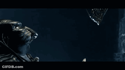 A Close Up Of A Person In A Dark Room GIF