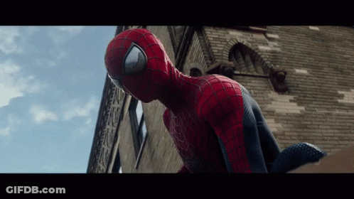 A Close Up Of A Person In A Spider Man Suit GIF
