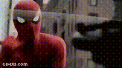 A Close Up Of A Person In A Spiderman Costume With A Bandage On His Head . GIF