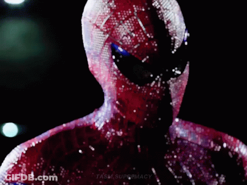A Close Up Of A Person In A Spiderman Costume With A Black Background . GIF