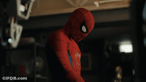 A Close Up Of A Person In A Spiderman Suit GIF