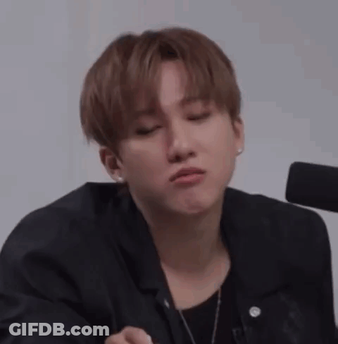 A Close Up Of A Person Making A Face With Their Mouth Open . GIF