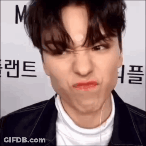 A Close Up Of A Person Making A Funny Face GIF
