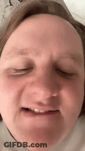 A Close Up Of A Person Making A Funny Face GIF