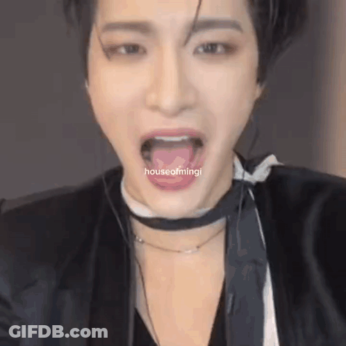A Close Up Of A Person Making A Funny Face With Their Tongue Out . GIF