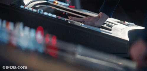 A Close Up Of A Person Playing A Piano GIF