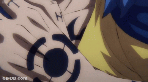A Close Up Of A Person 'S Arm With A Black Tattoo On It GIF