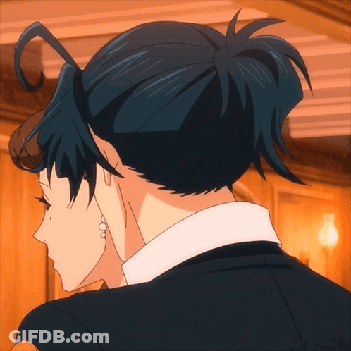 A Close Up Of A Person 'S Back With A Bun GIF