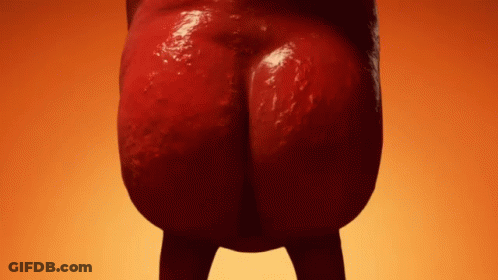 A Close Up Of A Person 'S Butt Against An Orange Background . GIF