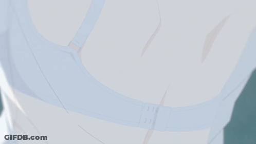 A Close Up Of A Person 'S Chest With A White Bra On GIF