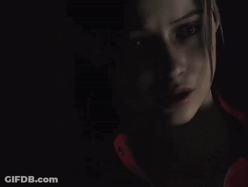 A Close Up Of A Person 'S Ear And Neck In The Dark . GIF
