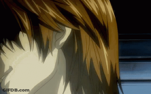 A Close Up Of A Person 'S Ear With A Black Background GIF