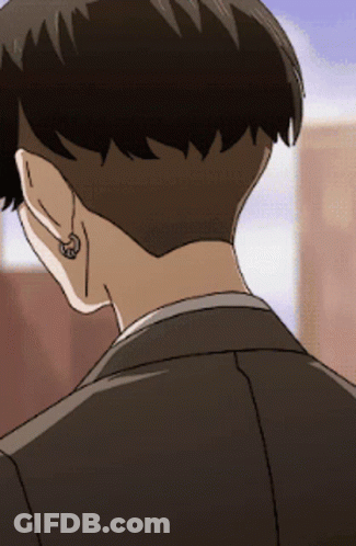 A Close Up Of A Person 'S Ear With A Piercing GIF