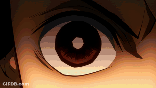 A Close Up Of A Person 'S Eye With A Dark Center GIF