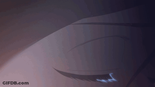 A Close Up Of A Person 'S Eye With A Light Coming Out Of It GIF