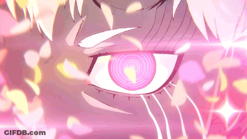 A Close Up Of A Person 'S Eye With A Pink Swirl In The Center GIF