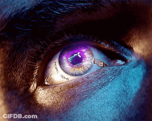 A Close Up Of A Person 'S Eye With A Purple Pupil That Says Atari Shi GIF