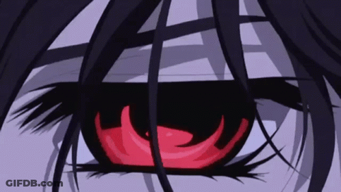 A Close Up Of A Person 'S Eye With A Red Center GIF