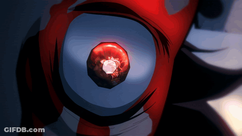 A Close Up Of A Person 'S Eye With A Red Glowing Object In It GIF