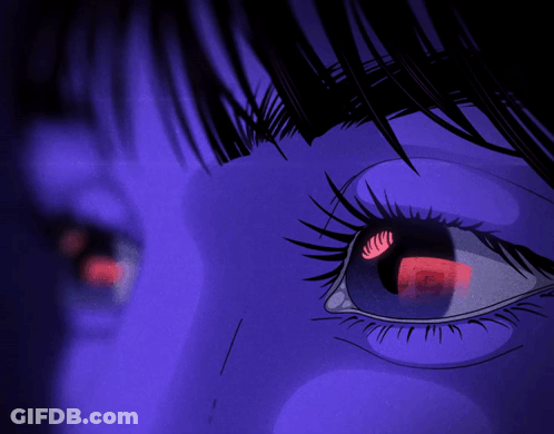 A Close Up Of A Person 'S Eye With A Reflection Of A Phone In It GIF