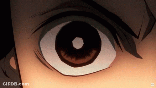 A Close Up Of A Person 'S Eye With A White Circle In The Middle GIF