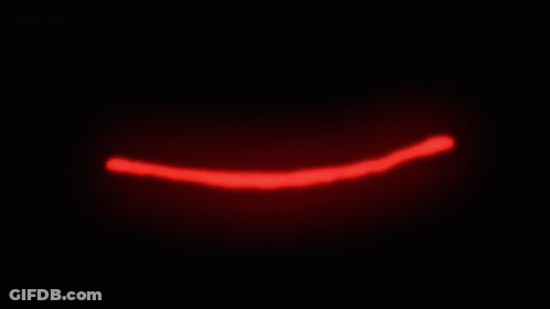 A Close Up Of A Person 'S Eye With Blood Dripping Out Of It . GIF