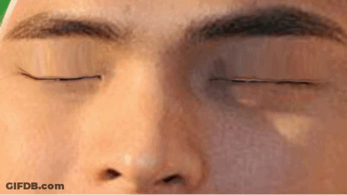 A Close Up Of A Person 'S Eye With Their Eyes Closed GIF