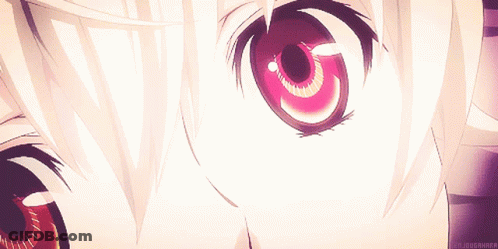 A Close Up Of A Person 'S Eyes With A Purple Background GIF