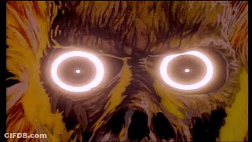 A Close Up Of A Person 'S Eyes With Glowing Circles Around Them GIF