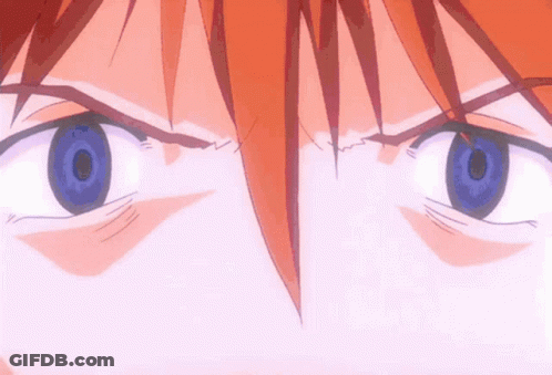 Close Up Of Person's Red Hair And Eyes GIF