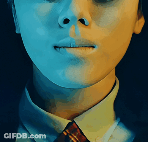 A Close Up Of A Person 'S Face And Neck GIF