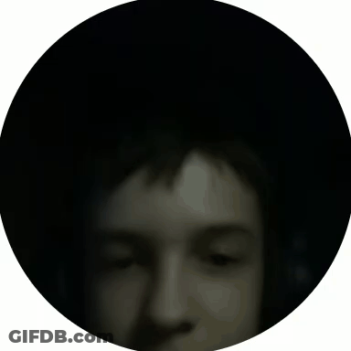 A Close Up Of A Person 'S Face In A Circle GIF