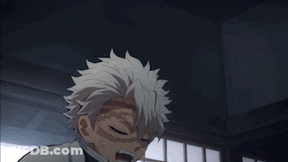 A Close Up Of A Person 'S Face In A Dark Room GIF