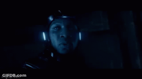 A Close Up Of A Person 'S Face In A Dark Room With The Words Imgflip.com At The Bottom GIF