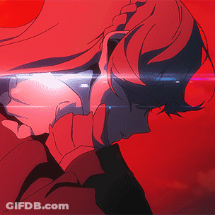 A Close Up Of A Person 'S Face In A Red Background GIF