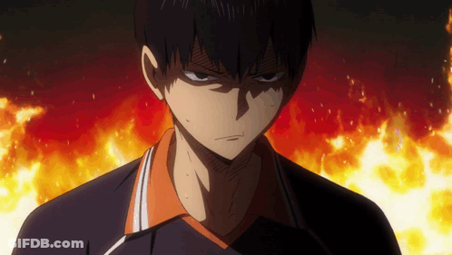 A Close Up Of A Person 'S Face In Front Of A Fire Background GIF