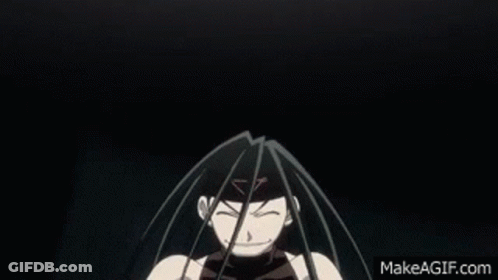 A Close Up Of A Person 'S Face Making A Funny Face . GIF