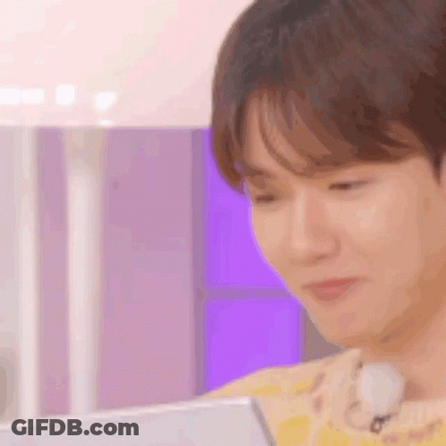 A Close Up Of A Person 'S Face While Using A Tablet Computer . GIF