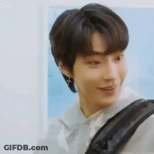 A Close Up Of A Person 'S Face With A Backpack . GIF