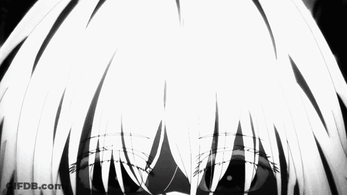 A Close Up Of A Person 'S Face With A Black Background GIF