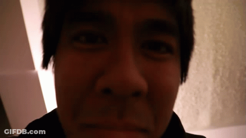 A Close Up Of A Person 'S Face With A Black Eye GIF