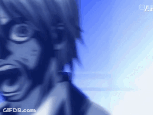 Close Up Of Person's Face With Blue Background And Glasses GIF
