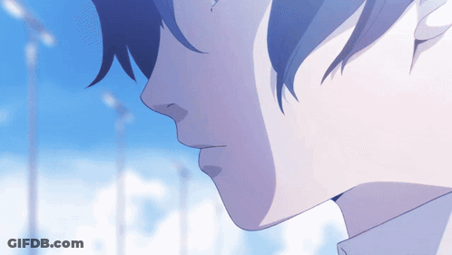 Close Up Of Person's Face With Blue Background GIF