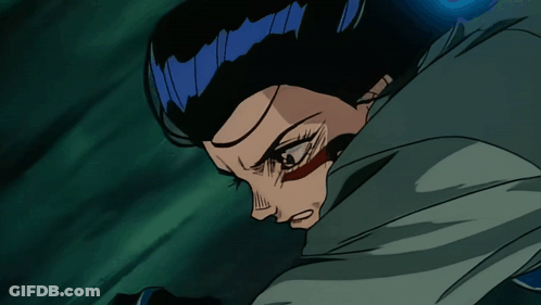 A Close Up Of A Person 'S Face With A Blue Hair GIF